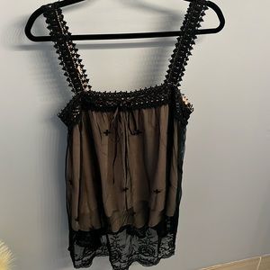 Black sleeveless lace embroidered top